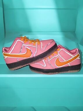 NikePower Puff Kids Low-Top Sneakers in Pink with Orange Swoosh